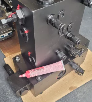 Tamper-proofing hydraulic manifold blocks